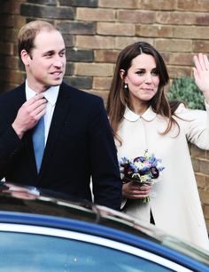 prince william and kate are waving to the crowd