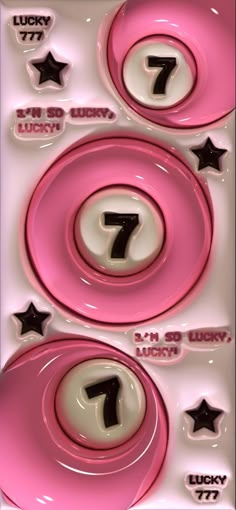 a pink and white plate with numbers on it