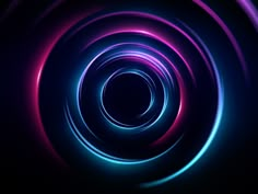 an abstract background with blue, pink and purple circles in the center on a black background