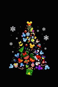 a christmas tree with mickey mouses and other holiday decorations on it's side