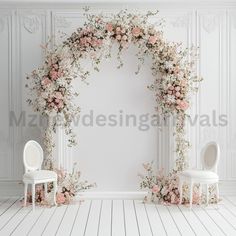 an arch with flowers and two chairs in front of it on a white floor next to a wall