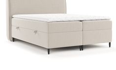 an upholstered bed frame with two drawers on each side and a mattress underneath