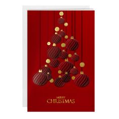 a christmas card with red and gold baubles hanging from the top, on a red background