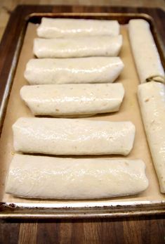 the dough is rolled up and ready to go into the oven