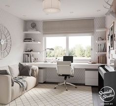 a living room filled with furniture and a computer desk in front of a large window