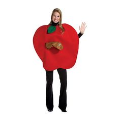 a woman in a red apple costume is standing with her hands out to the side