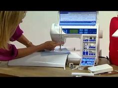 a woman is working on a sewing machine