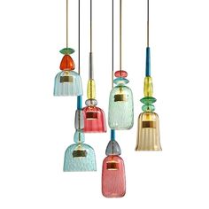 multi - colored glass pendants hanging from the ceiling