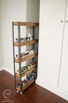 the pantry shelving is organized with spices and condiments