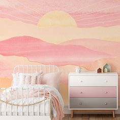 a pink and yellow painted wall in a girls'bedroom with a white bed, dresser and chest of drawers