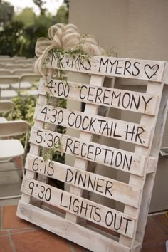 a wooden sign that says mr and mrs's ceremony, 350 cocktail hour reception, 35 dinner hours, 39 lights out