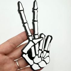 a hand that has been made to look like it is holding up the peace sign