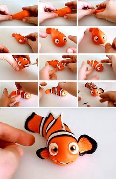 someone is making an origami clown fish out of paper