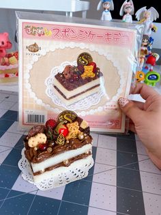 a piece of cake sitting on top of a table next to a package of candy