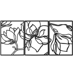 three metal wall art pieces with flowers on them, one is black and the other is white