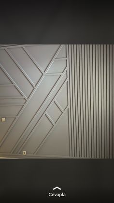 the ceiling is painted white and has lines on it