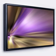 an abstract painting in purple and gold on a white wall with a black framed frame