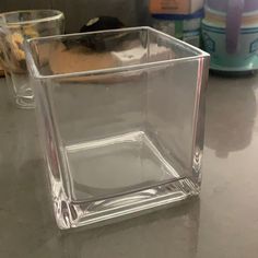 a clear square container sitting on top of a counter