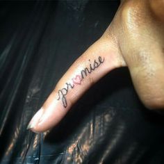 a person's hand with a small tattoo on it that says, princess written in cursive writing