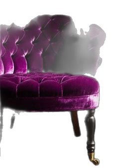 a purple chair sitting on top of a white floor