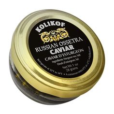 an open jar of russian ostera cavanar with gold trimmings