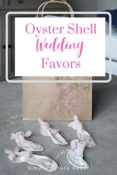 a bag with some shoes on top of it and the words oyster shell wedding favors