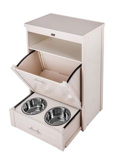 an open box with two bowls in it on a white background, showing the inside compartment