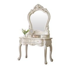 an antique white dressing table with mirror and potted plant on the top, isolated against a white background