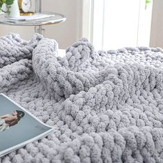 PRICES MAY VARY. HOLEY CHUNKY KNIT BLANKET - Our grey chunky throw blanket is 100% hand knit with jumbo chenille Yarn. This plush chunky blanket will be a good home décor throw blanket for couch, bed and sofa. SPECIAL SIZE FOR 3-SEATER SOFA AND BED ENDS - Sized at 40 x 80 inches. Snuggling with your family in a 3-seater sofa with these cuddly chunky knit blanket, watching a savoring movie, folding and draping them on the bed ends as a final touch, enjoy it！ PRACTICAL AND SWEET GIFT IDEA - Chunky Big Knit Blanket, Cable Knit Blankets, Chunky Knit Throw Blanket, Bedroom Blanket, Cable Knit Throw, Jumbo Yarn, Chenille Blanket, Chunky Crochet Blanket, Big Knits