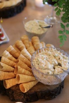 a plate with crackers and dip on it