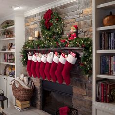 christmas stockings hanging from a fireplace mantel