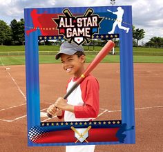 a young boy holding a baseball bat in front of a sign that says all star game