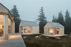 two small wooden cabins sitting next to each other