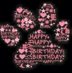 a dog's paw with the words happy birthday written in pink and white on it