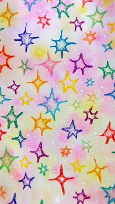 colorful stars are painted on a white background