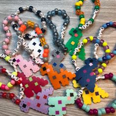 "Do you want to be in the most exclusive club on Etsy? Yes? Then you need these Dino Club perler bracelets  All backs are ironed 🖤 They come in a set of 10 and are completely random in color. You will not get any of the same color in the set, but they will all say \"Dino Club\" ! If you do want specific Wording, there is an additional charge, but you will still get a random selection of colors!" Dino Theme, Exclusive Club, Bead Projects, Kandi Bracelets, Rave Festival, Perler Bead Art, Swaggy Outfits, Perler Bead, Perler Beads