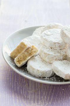 a plate filled with marshmallows and powdered sugar