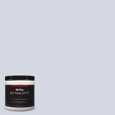 a jar of dymasty color paste on a gray background