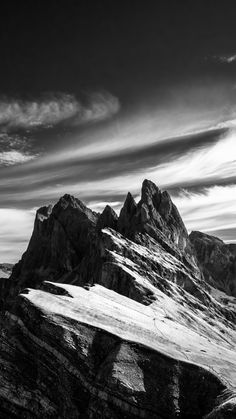 black and white photograph of snow covered mountains