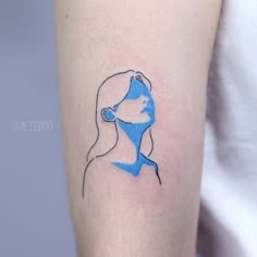 a woman's arm with a blue line drawing on the left side of her body