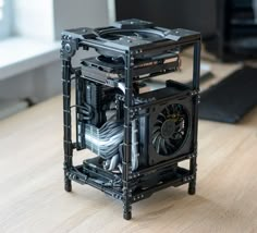 a computer case sitting on top of a wooden desk