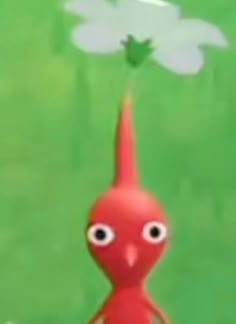 an animated red bird with green leaves on it's head and eyes flying in the air