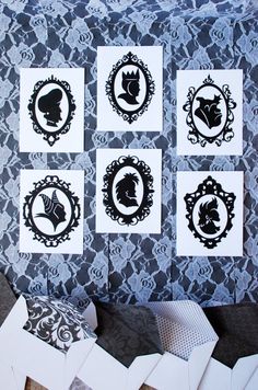 the wall is decorated with black and white designs