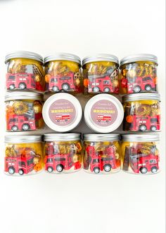 several jars filled with different types of candies and candy on top of each other