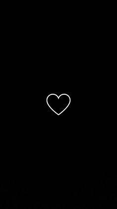 a black background with a white heart in the middle