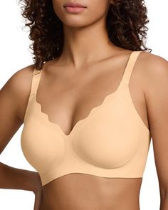 PRICES MAY VARY. COMFORTABLE FABRIC：Women's seamless bra is made of 85% polyamide and 15% elastane, wireless design coupled with super soft fabric is very comfortable to wear, cool and breathable, with a variety of sizes, you can find the right size for different cups. UNIQUE DESIGN: Jelly strips and push-up design provide great support to the breasts, showing off a natural fuller bust that exudes your confidence and charm. The scalloped wave design of the neckline increases the fashion sense of the bra, and full coverage design can cover the side breasts and emphasize the perfect body shape. SEAMLESS &WIRELESS:This comfort bra has a seamless and no underwire design that wears like your own second skin， and provides maximum comfort. The bottom is supported by soft jelly strips that hold th Supportive Bras, Everyday Bra, Seamless Bra, Support Bras, Wave Design, Push Up Bra, Body Shape, Second Skin, Fashion Sense