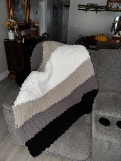 a couch with a blanket on top of it