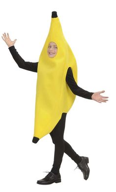 a young boy dressed in a banana costume