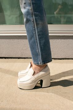 Chunky white leather platform loafer with a memory foam footbed. Platform heel measures 4 inches. The Lindo runs large. We recommend sizing down. White Platform Loafers Outfit, White Platform Loafers, Platform Loafers Outfit, Loafer Platform, Platform Outfit, White Loafers, Intentionally Blank, Heel Loafers, Loafers Outfit