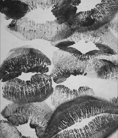 black and white photograph of lipsticks with different shapes